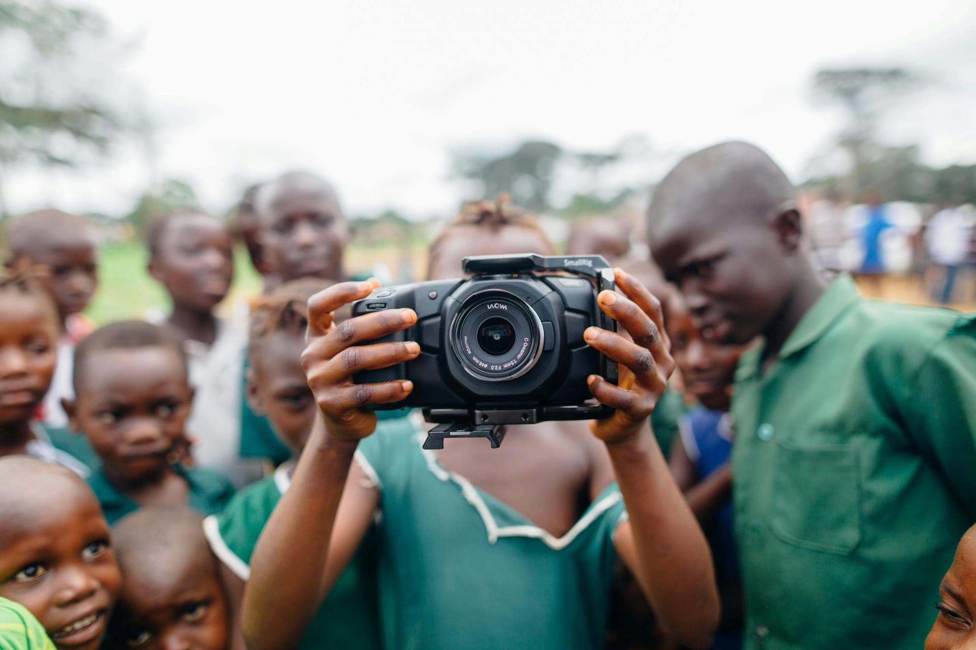 Young photographer at sunset